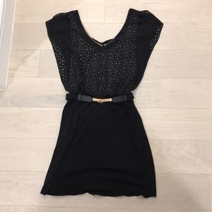 Black dress with belt and nude lining.